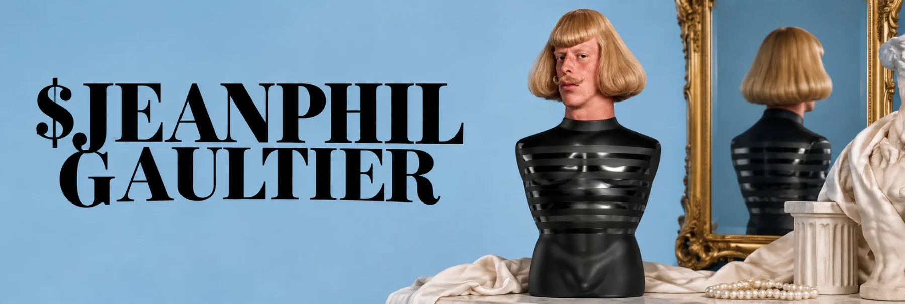 $JEANPHIL GAULTIER banner: the bottle on a marble table beside a gold mirror